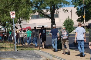 Participants in the MissionShift Institute trek through different parts of St. Louis on a tour of ministries in the metro area, Sept. 13, 2014.