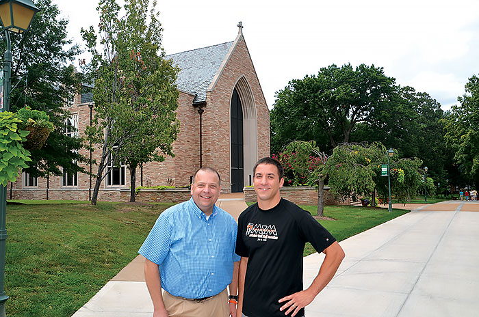 Rev. Bill Wrede, director of ministerial recruitment and admissions, is often known as Father Ted, a name he picked up while working in New York City. He often can be seen talking with students around the campus such as fourth-year student Eric Hauan.